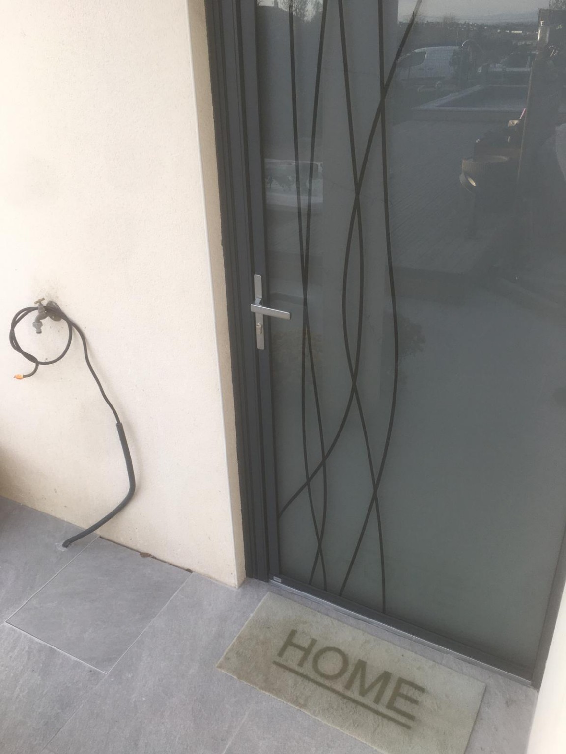 Porte d’entrée vitrée aluminium