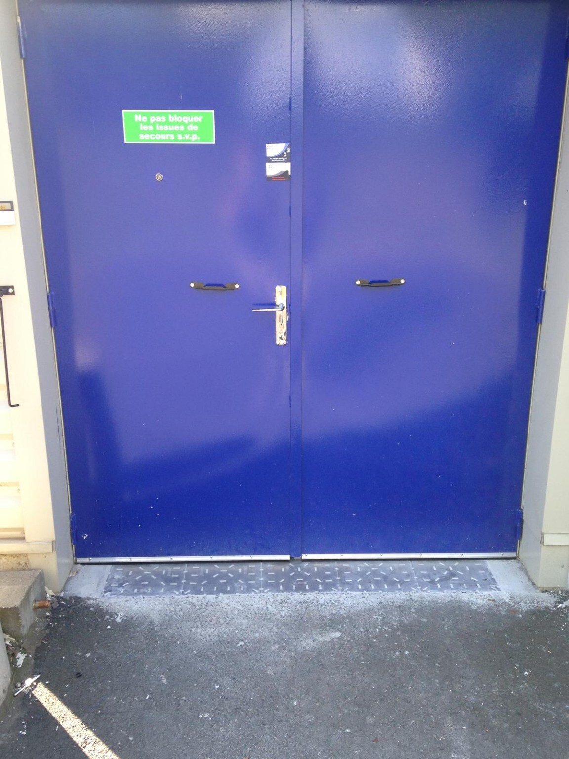 Porte technique double battant